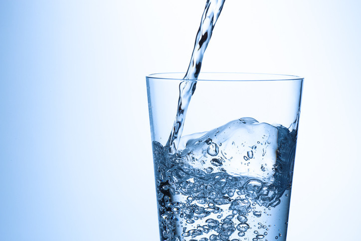 Water pouring into a glass